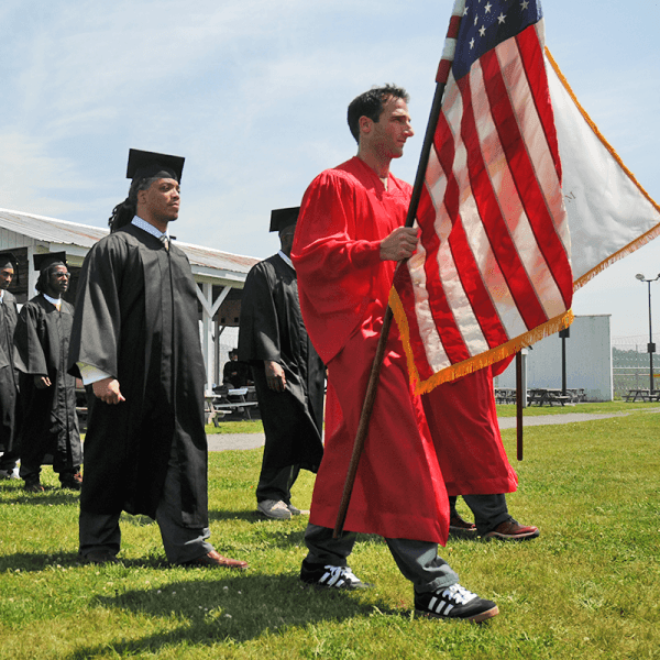 Graduating Students walk at BPI Woodbourne Commencment Ceremony