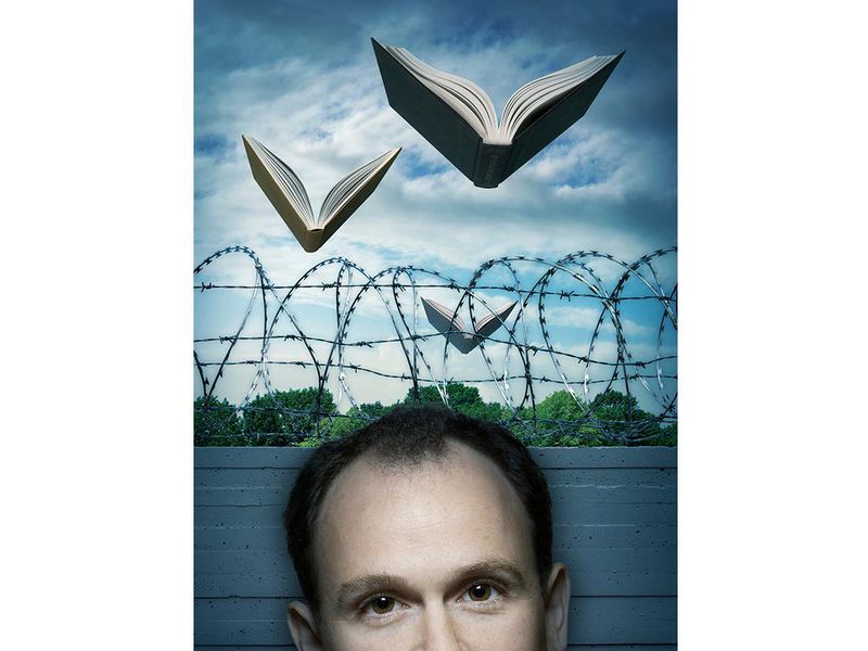 Photo illustration of books flying over a barbed wire fence, and a cropped portrait of BPI's Max Kenner in the foreground.