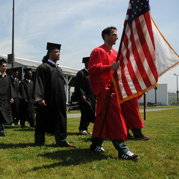 Graduating Students walk at Woodbourne Commencement Ceremony