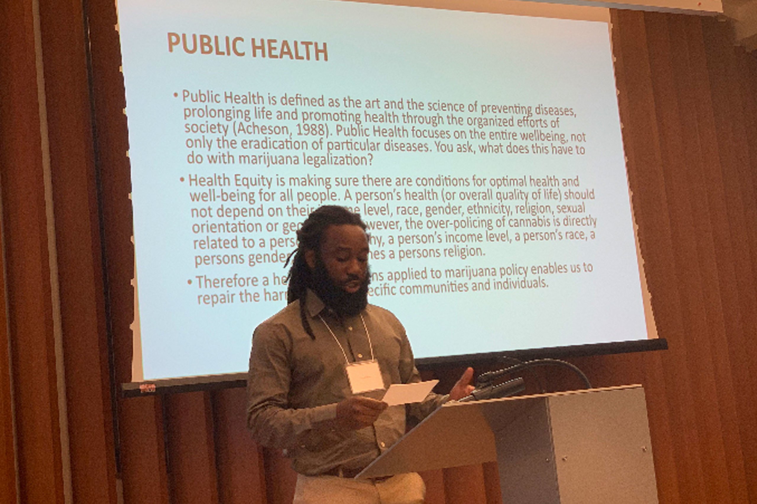 Public Health Fellow presenting research