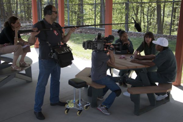 Producer Sarah Botstein and cinematographer Buddy Squires on location at Taconic Correctional Facility. Skiff Mountain Films