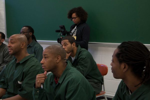 Cinematographer Nadia Hallgren on location at Eastern New York Correctional Facility. Skiff Mountain Films