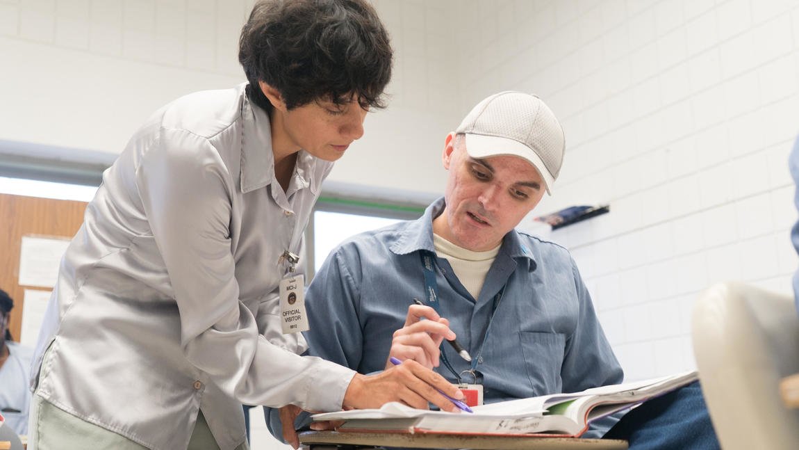 Goucher professor Citlali Miranda-Aldaco works with student Shawn Vankirk.