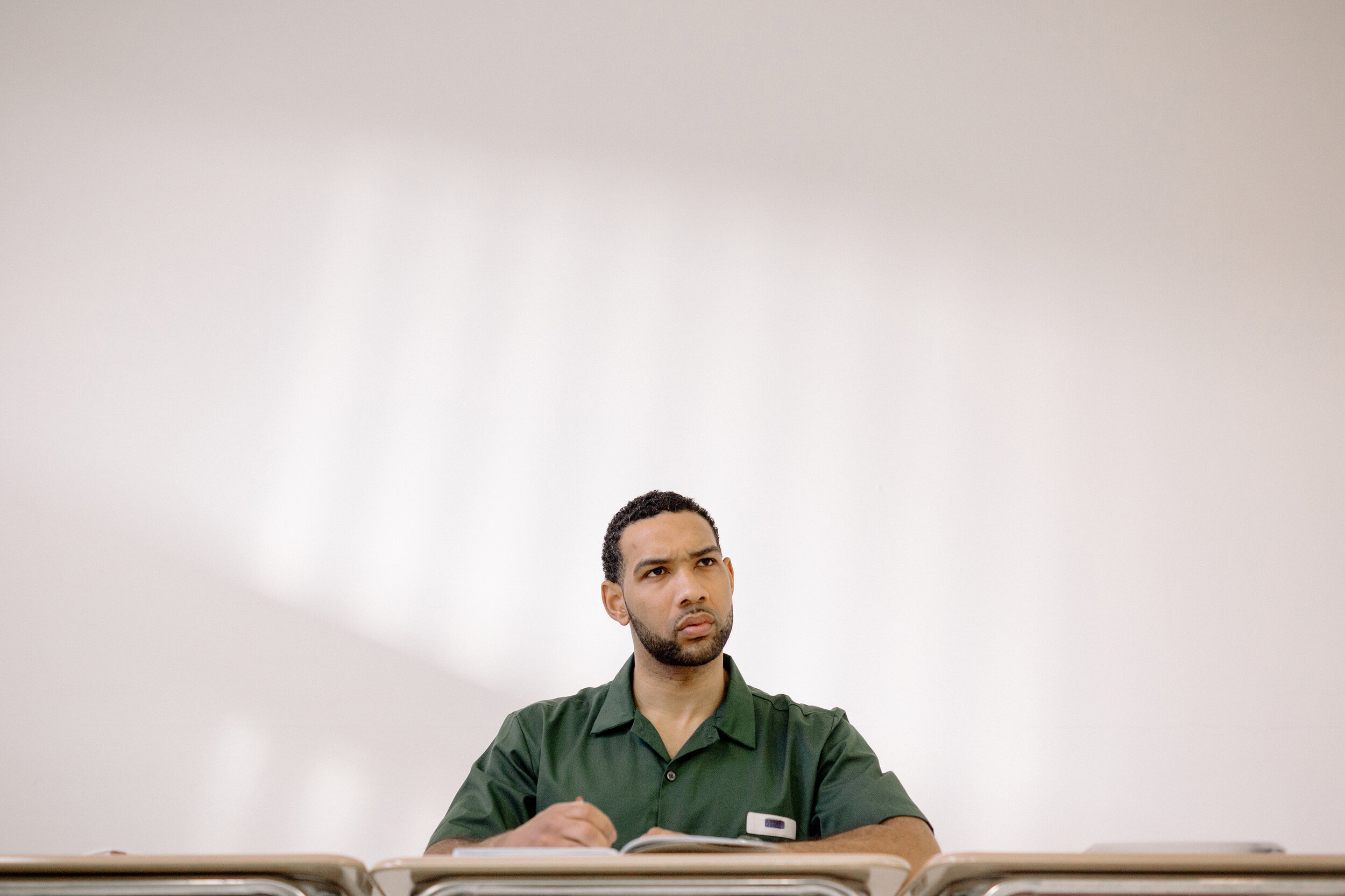 Dyjuan Tatro at his classroom desk.