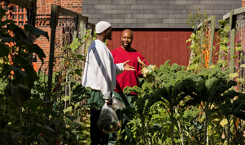 Two students in the garden.