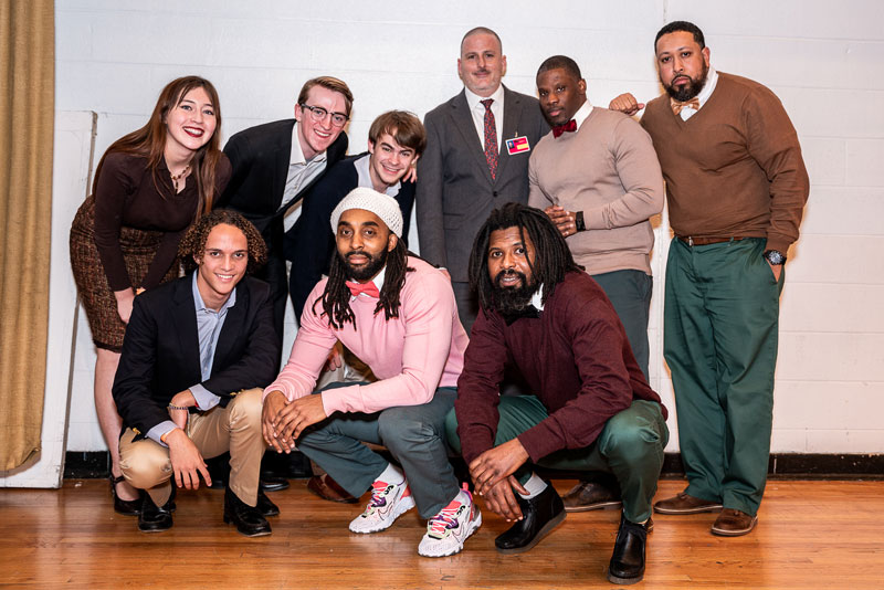 BPI Debate team posing for photo with their competitors from Brown.