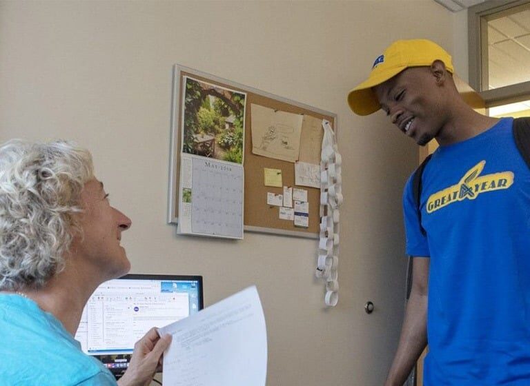 Donte Small turns in a final exam to computer science professor Jill Zimmerman at Goucher College in Towson, Md., on May 22.