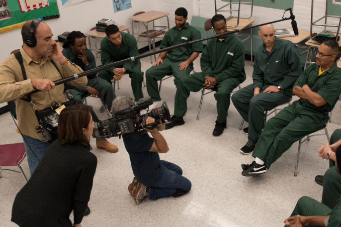 Documentary Film team filming BPI students sitting in a semi-circle