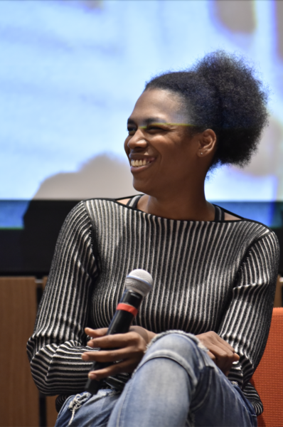 Close up of one panelist sitting on stage