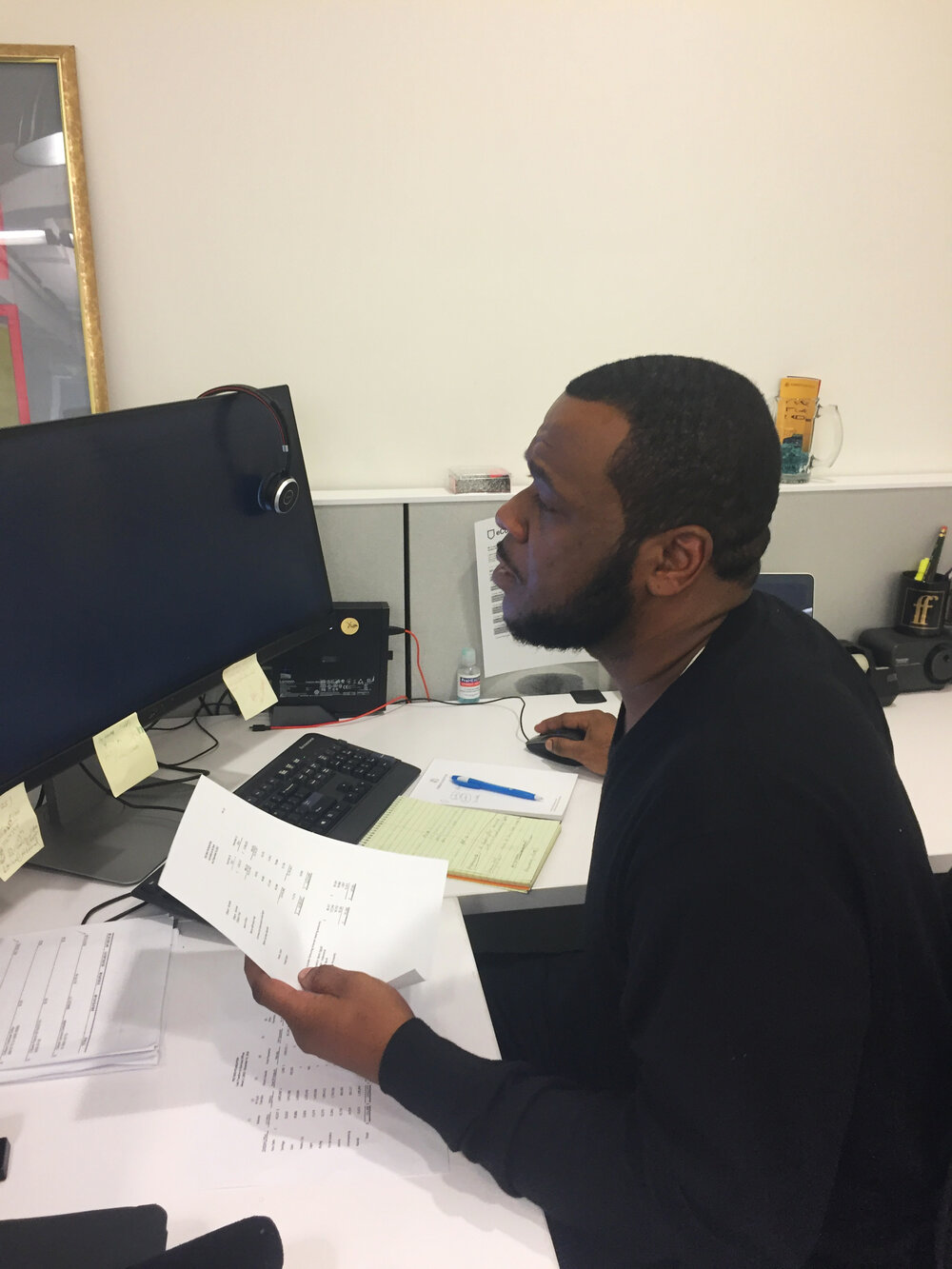 Lavar Gibson working at a computer desk.