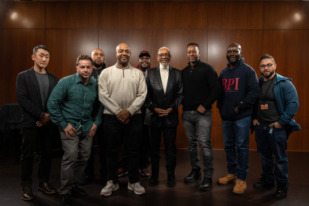 Alumni of the Bard Prison Initiative standing with Congressman Bobby L. Rush (D-Ill.)